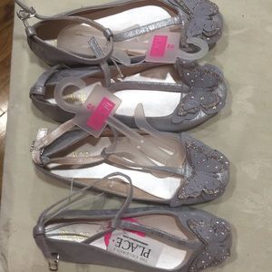 This is 2 pairs new shoes.Size 2 silver $20.each